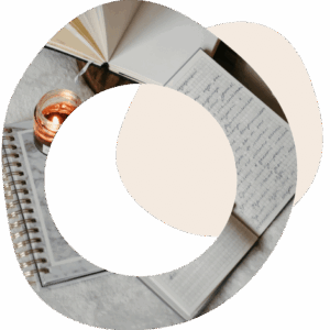 Abstract image of journals, books and a pen