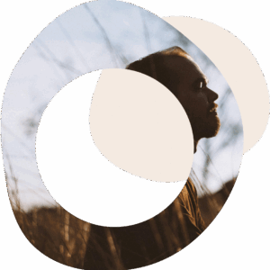 abstract circles image of a male standing in nature and looking into the distance