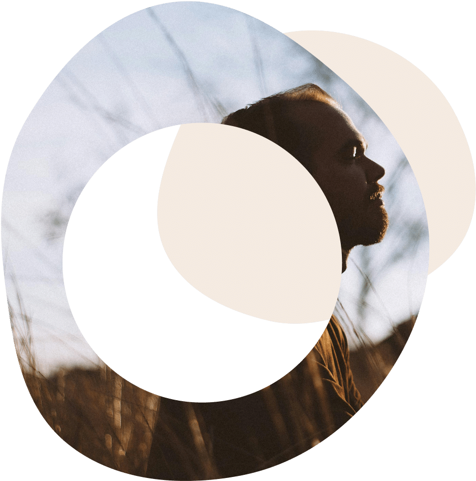abstract circles image of a male standing in nature and looking into the distance